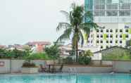 Swimming Pool 3 Modern 1BR at Margonda Residence 1 Apartment By Travelio