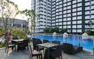 Swimming Pool 6 Pool View Studio at West Vista Apartment By Travelio