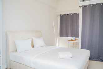 Kamar Tidur 4 Elegant Studio Apartment at Parkland Avenue By Travelio