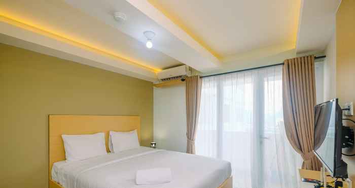 Kamar Tidur Stylish and Relaxing Studio at Amethyst Tower Apartment By Travelio