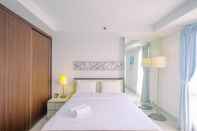 Bedroom Elegant Studio Apartment at Azalea Suites By Travelio