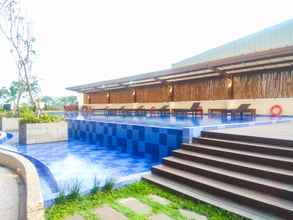 Swimming Pool 4 Elegant Studio Apartment at Azalea Suites By Travelio