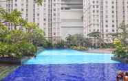 Swimming Pool 3 Comfort 2BR Apartment near Mall Green Bay Pluit By Travelio