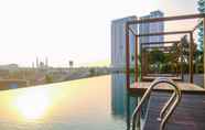 Swimming Pool 3 Stylish and Cozy 1BR at Grand Kamala Lagoon Apartment By Travelio