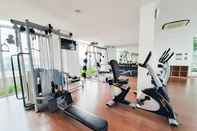 Fitness Center Simply Modern 1BR at M-Town Signature Apartment By Travelio