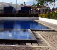 Swimming Pool 4 Comfy Studio at Tifolia Apartment with City View By Travelio