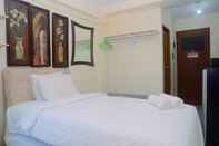 Kamar Tidur Comfy Studio at Tifolia Apartment with City View By Travelio