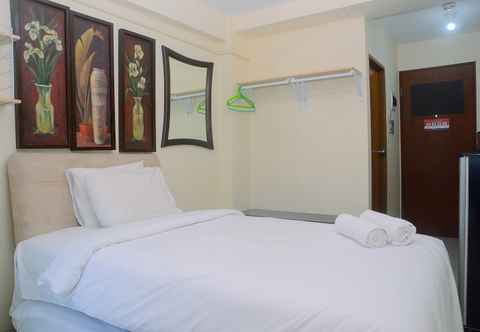 Bedroom Comfy Studio at Tifolia Apartment with City View By Travelio
