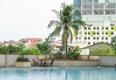 Swimming Pool 6 Compact Studio at Margonda Residence 2 Apartment By Travelio