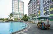 Kolam Renang 5 Compact Studio at Margonda Residence 2 Apartment By Travelio