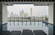 Swimming Pool 4 Elegant and Cozy 2BR Apartment at Kebayoran Icon By Travelio