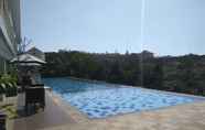 Swimming Pool 3 Studio Apartment near Universitas Padjadjaran at Taman Melati Jatinangor By Travelio