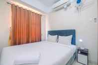 Bedroom Minimalist 2BR at Green Park View Apartment By Travelio