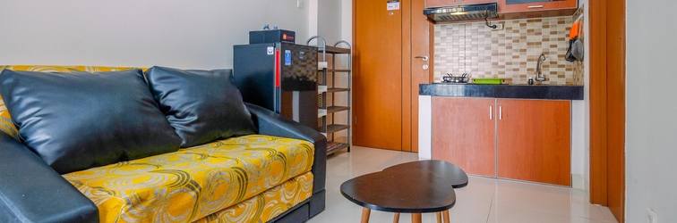 Lobi Minimalist 2BR at Green Park View Apartment By Travelio