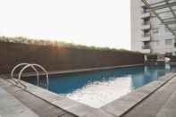 Swimming Pool Comfy Living Studio Apartment at Belmont Residence By Travelio