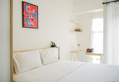 Kamar Tidur Simple and Cozy Studio Apartment at Akasa Pure Living BSD By Travelio