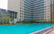 Swimming Pool 5 River View 2BR at Teluk Intan Apartment By Travelio