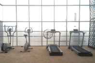 Fitness Center Spacious and Comfortable 2BR at Oasis Cikarang Apartment By Travelio