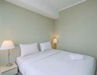 Bedroom 2 Spacious and Comfortable 2BR at Oasis Cikarang Apartment By Travelio