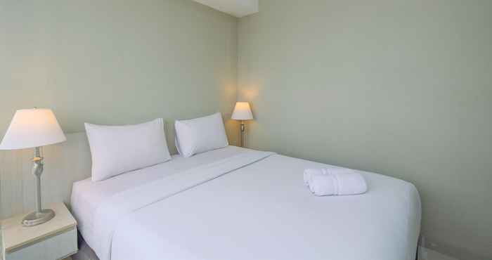 Bedroom Spacious and Comfortable 2BR at Oasis Cikarang Apartment By Travelio