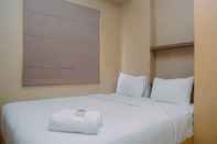 Bilik Tidur Near Mall Green Pramuka City 2BR Apartment By Travelio
