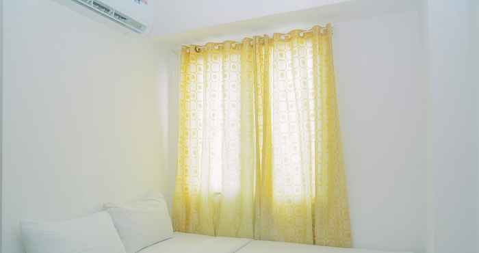 Bedroom Furnished and Comfy 2BR Bassura City Apartment near Mall By Travelio