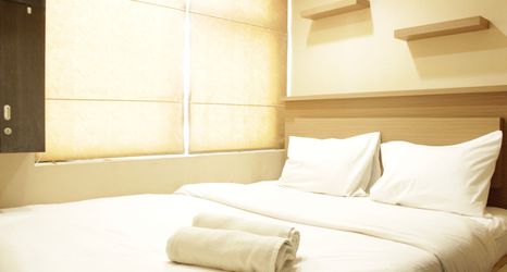 Bedroom 2 Well Appointed 2BR at Jarrdin Cihampelas Apartment By Travelio