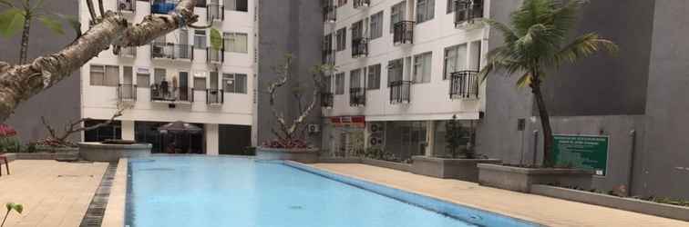 Lobi Well Appointed 2BR at Jarrdin Cihampelas Apartment By Travelio