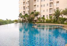 Swimming Pool 3 Cozy and Chic 1BR Apartment at Mustika Golf Residence By Travelio