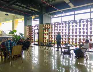 Lobby 2 Cozy Strategic 1BR Apartment at Atlanta Residence near Universitas Indonesia By Travelio