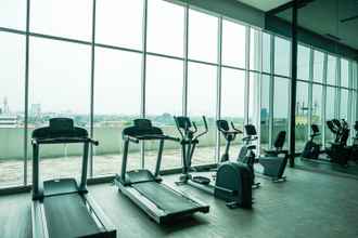 Fitness Center 4 Cozy and Stylish Studio Apartment Nine Residence By Travelio