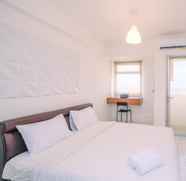 Bedroom 2 Tranquil and Cozy Studio Apartment at Gunung Putri Square By Travelio