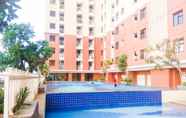 Swimming Pool 5 Cozy Studio at Lagoon Apartment near Bekasi Town Square By Travelio