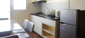 Common Space 5 Chic and Homey 2BR Apartment Newton Residence By Travelio