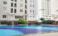 Kolam Renang 3 Relax Living 2BR at Bassura City Apartment By Travelio
