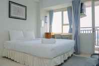 ห้องนอน Elegant Studio Apartment at Margonda Residence 5 By Travelio