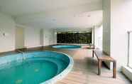 Swimming Pool 2 Best Location Studio Apartment at Capitol Park Residence By Travelio