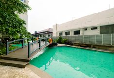 Swimming Pool 4 Best Location Studio Apartment at Capitol Park Residence By Travelio