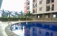 Lobby 3 New Furnished 1BR at Green Park View Apartment By Travelio