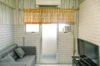 Lobi Cozy 2BR Apartment at Sentra Timur Residence Apartment By Travelio