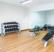 Fitness Center 5 Relaxing and Beautiful Studio Tifolia Apartment By Travelio