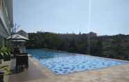 Swimming Pool 5 Mountain View Studio at Taman Melati Jatinangor Apartment By Travelio