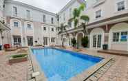 Swimming Pool 2 Best Deal Guest House Studio at Alesha Vanya Park (Sharing Bathroom) By Travelio