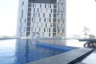 Swimming Pool 1BR Connected to Marvell City Mall at The Linden Apartment By Travelio