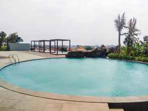 Swimming Pool 4 Modern Style Studio at Grand Kamala Lagoon Apartment By Travelio
