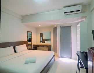 Bedroom 2 Comfy and Elegant Studio Apartment at Tamansari Sudirman By Travelio
