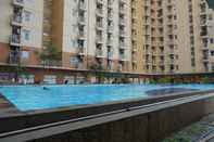 Kolam Renang Duri Kosambi Relaxing 3BR Apartment at Green Palm Residence By Travelio