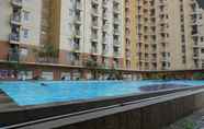 Swimming Pool 3 Duri Kosambi Relaxing 3BR Apartment at Green Palm Residence By Travelio