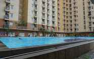 Kolam Renang 3 Duri Kosambi Relaxing 3BR Apartment at Green Palm Residence By Travelio