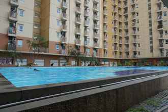 Swimming Pool 4 Duri Kosambi Relaxing 3BR Apartment at Green Palm Residence By Travelio